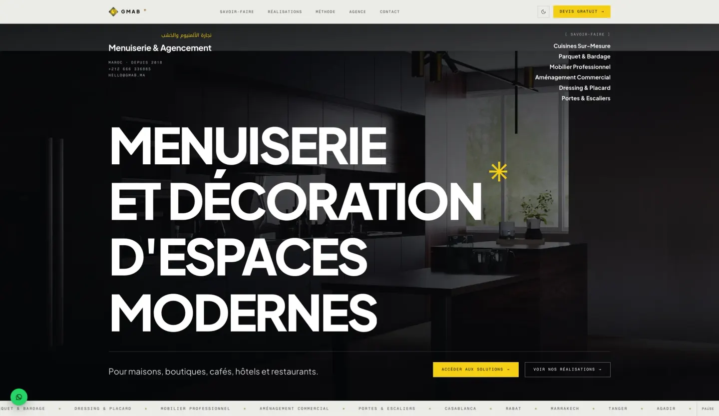 GMAB homepage with the stacked headline Menuiserie et décoration d'espaces modernes and a single yellow accent — light mode